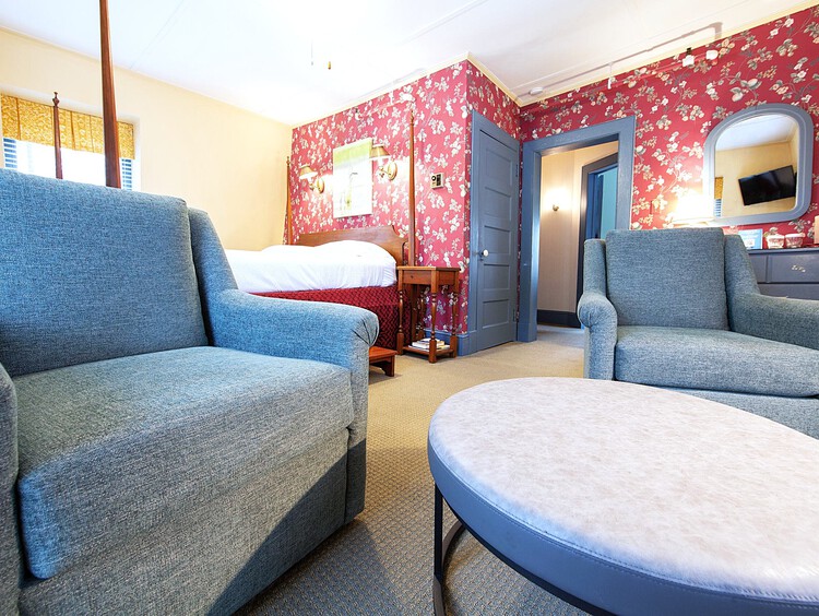 Waterfront hotel room with sitting area