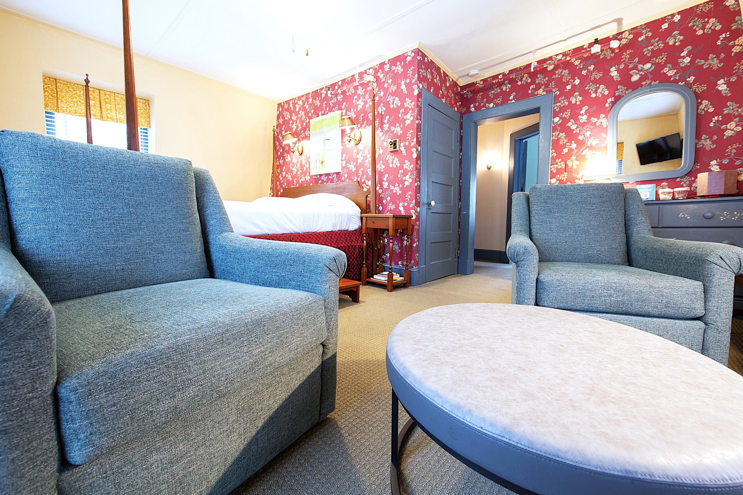 Waterfront hotel room with sitting area