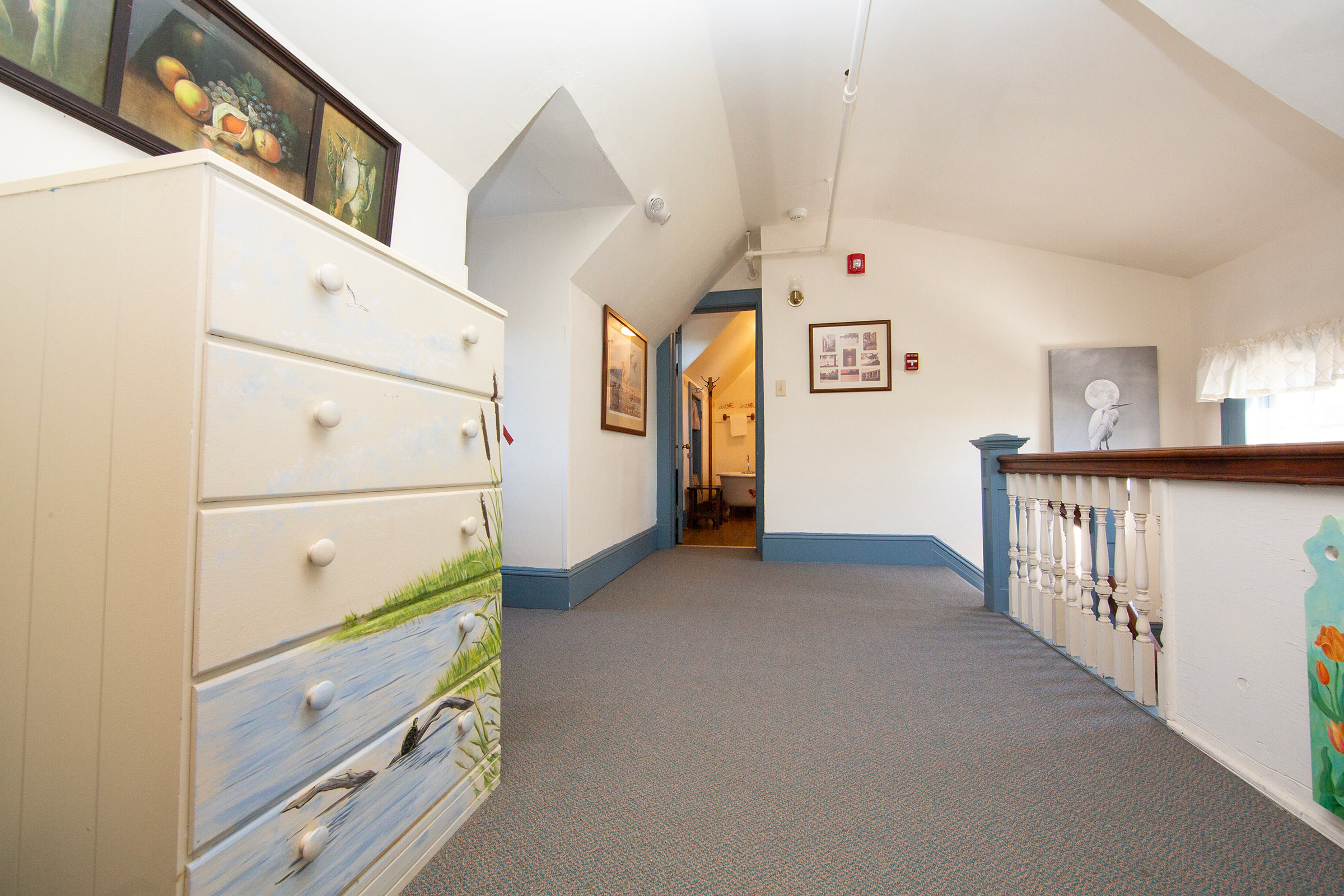 Private Gated Hallway to Beach View Loft Suite's Bathroom with clawfoot tub and shower